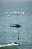 A8V7102 Marines roping into moving speedboat